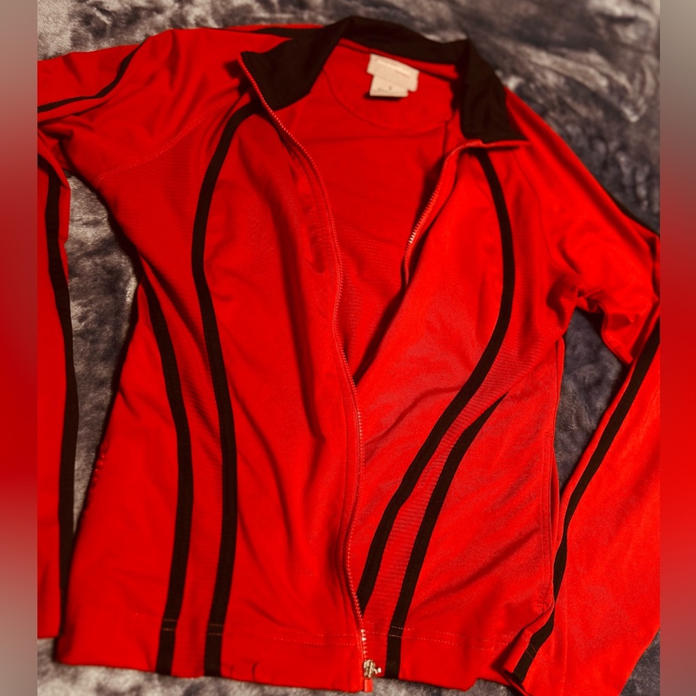Black, and red jacket. doesn’t have a zipper